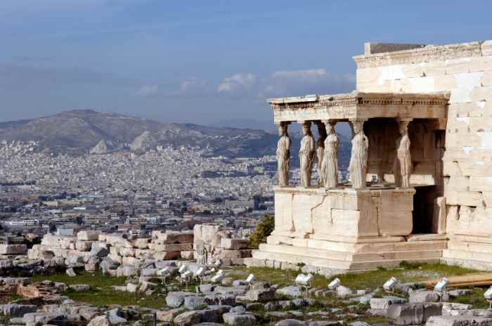 View of Athens and the Erechtheum (porch of the Caryatids) from the Acropolis.